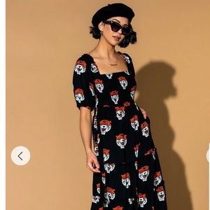 Dressed in lala ruffled tiger dress. It. Has. Pockets.